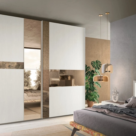 Armadio 16B con ante scorrevoli in melaminico effetto legno e inserti a specchio bronzato con e senza decoro di Corso 11