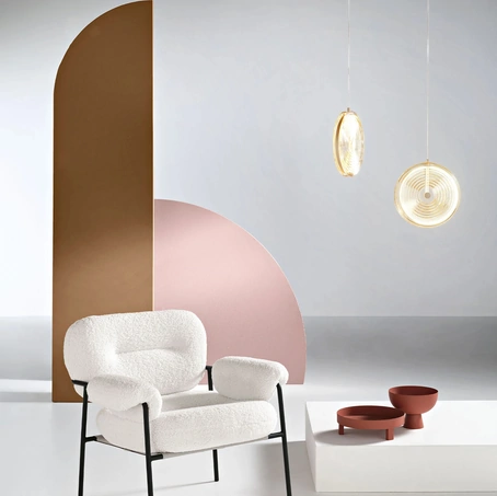 Poltrona Kent in tessuto bouclè di Ikone Casa