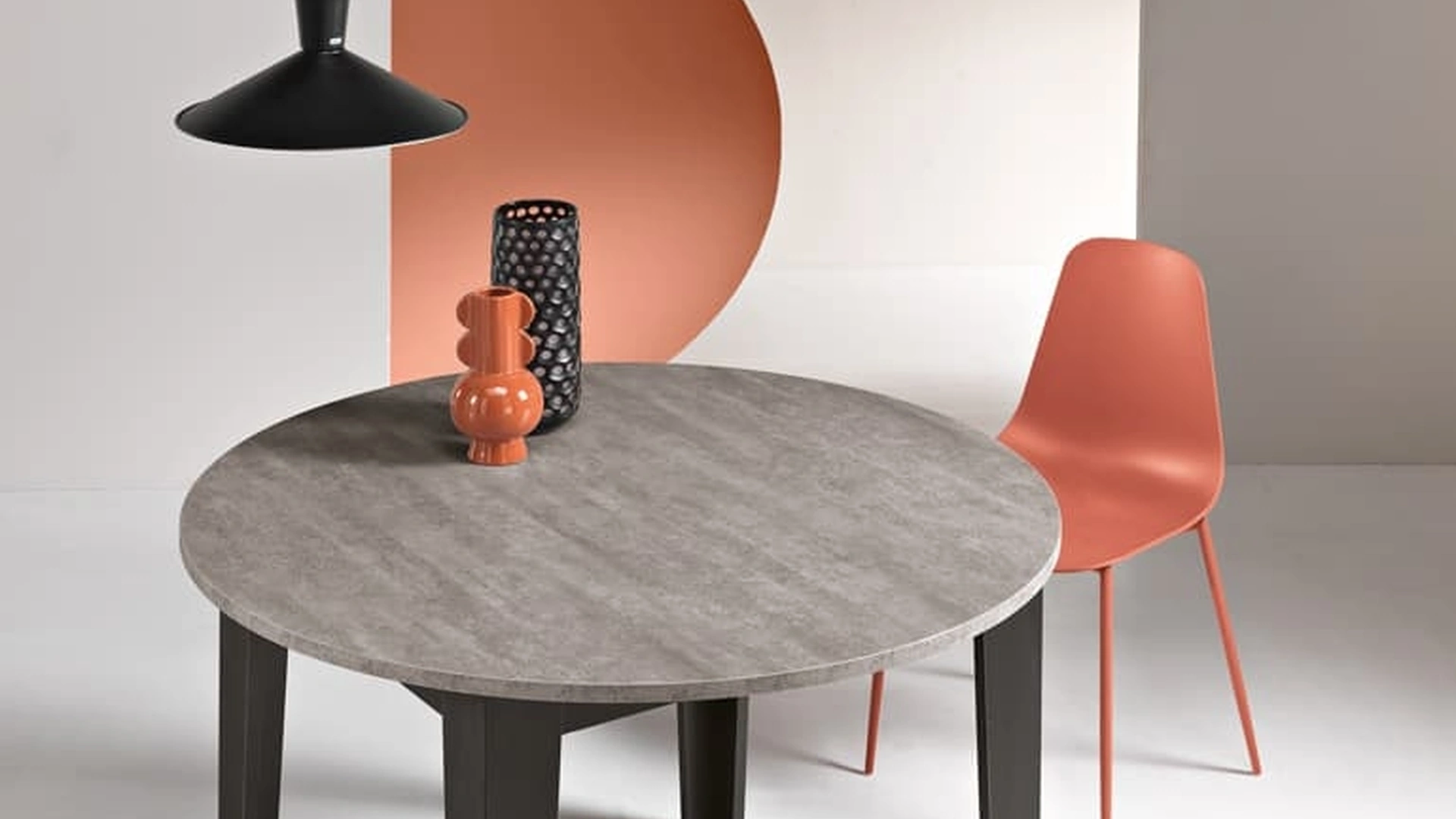 Tavolo tondo allungabile Modus finitura Cemento di Ikone Casa